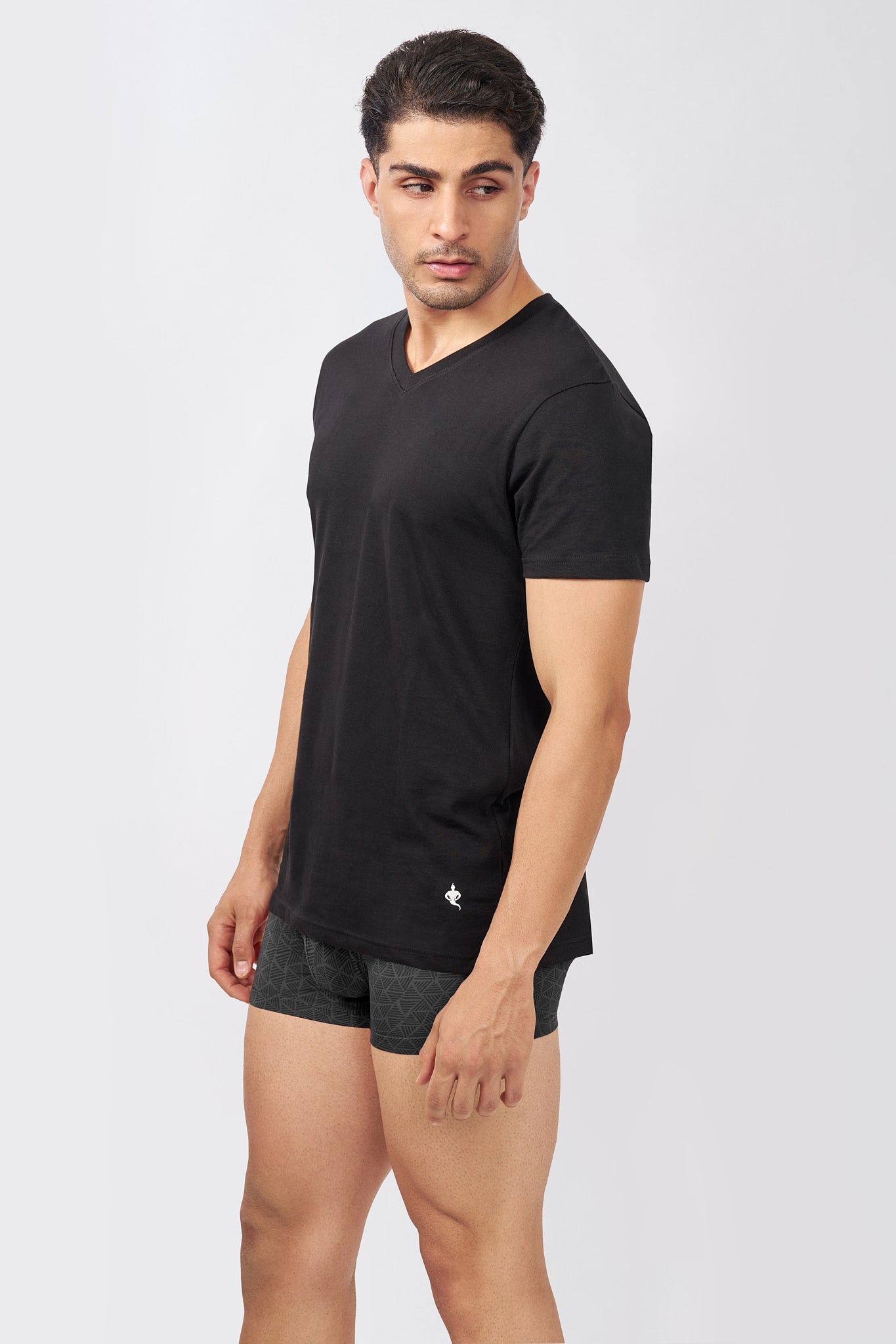 Macho Genie AeroCot Base+ men's solid black 100% cotton V-Neck undershirt, side profile showing the deep-cut V-Neck, short sleeves and fitted silhouette