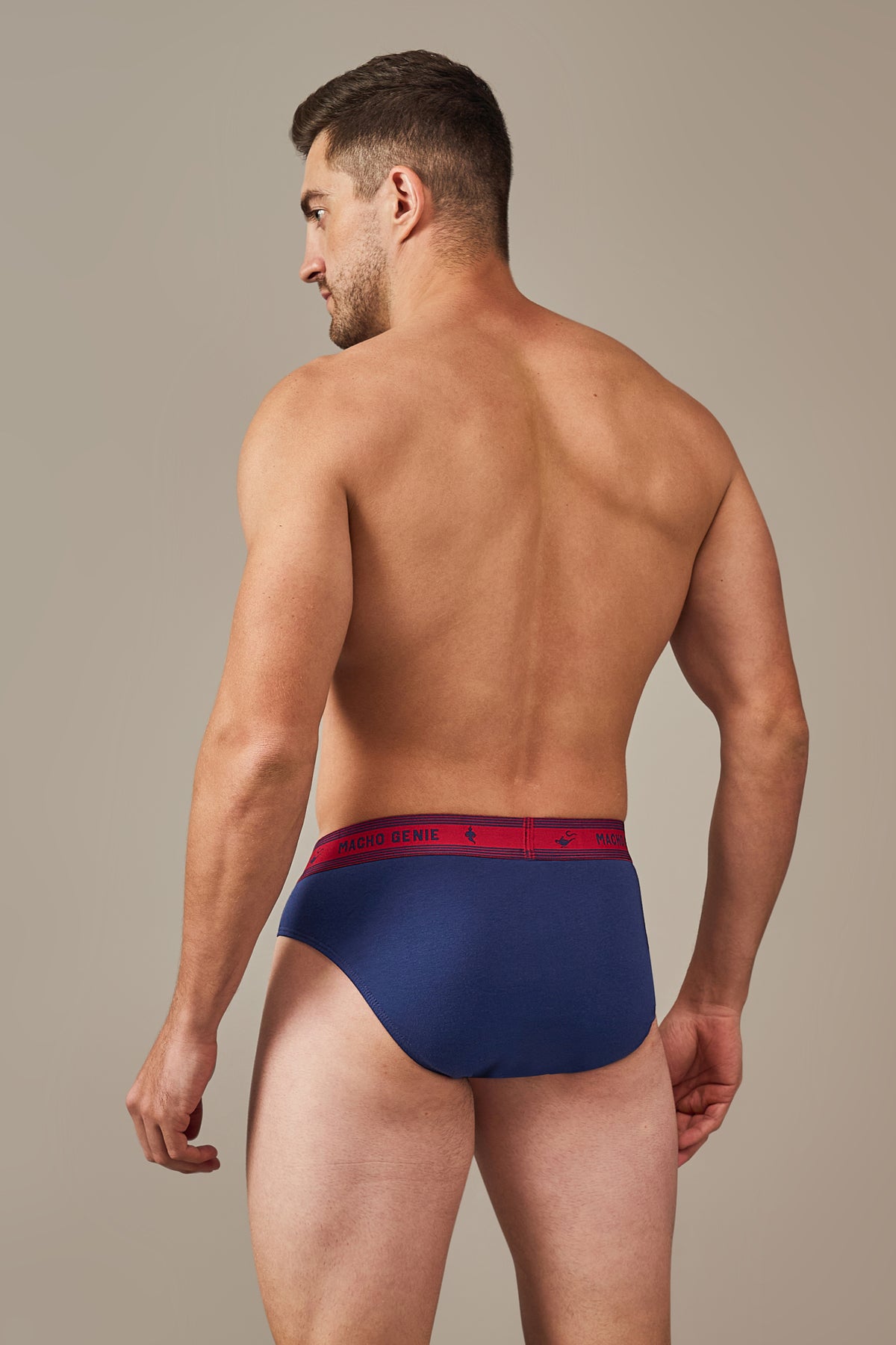 Macho Genie Bold Impressions men's cotton briefs in Midnight Navy shown from the back, showcasing the full-coverage seat and flexible waistband