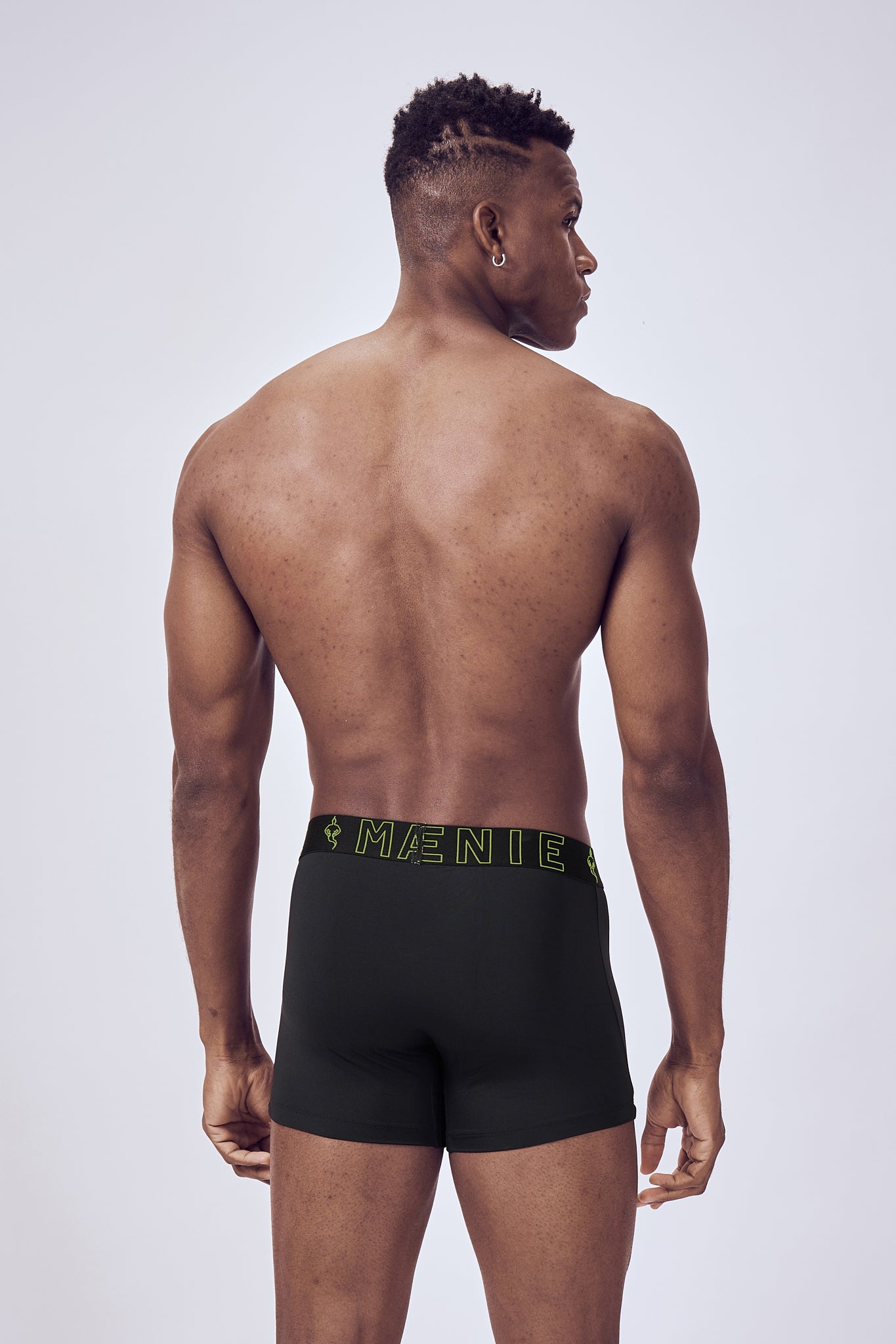 Macho Genie Evercore Performance Compression Raven Black Trunks shown from the back, highlighting the smooth rear fit, full coverage and flexible waistband