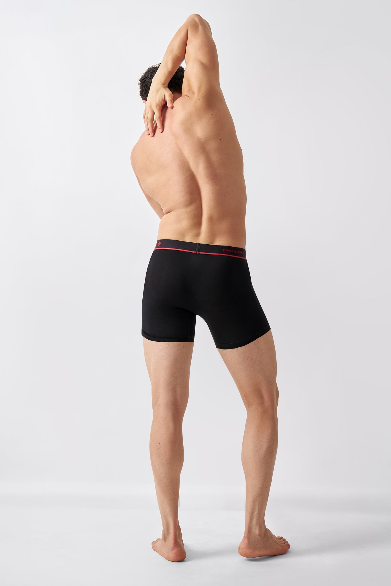 Macho Genie men's Jet Black bamboo boxer briefs shown from the back with smooth seat coverage, longer inseam and clean waistband finish