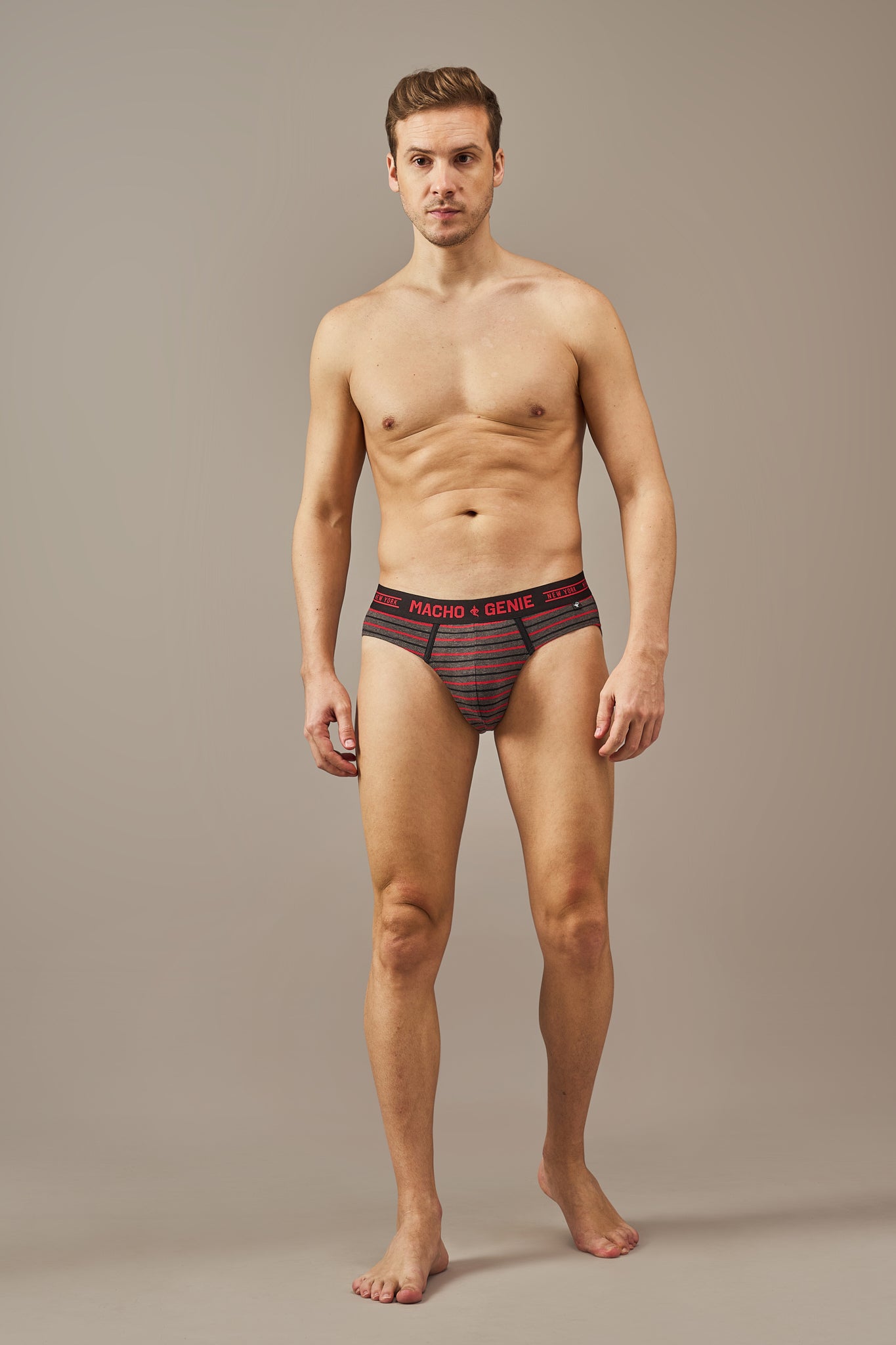 Men's black striped brief underwear made from soft breathable cotton with full coverage for everyday comfort