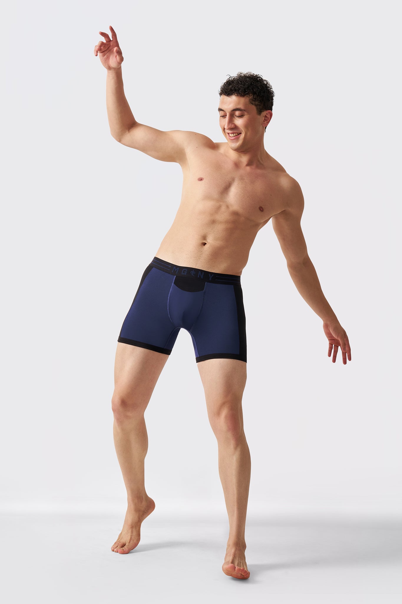 Man wearing Macho Genie navy stretch cotton boxer briefs for breathable comfort and freedom of movement