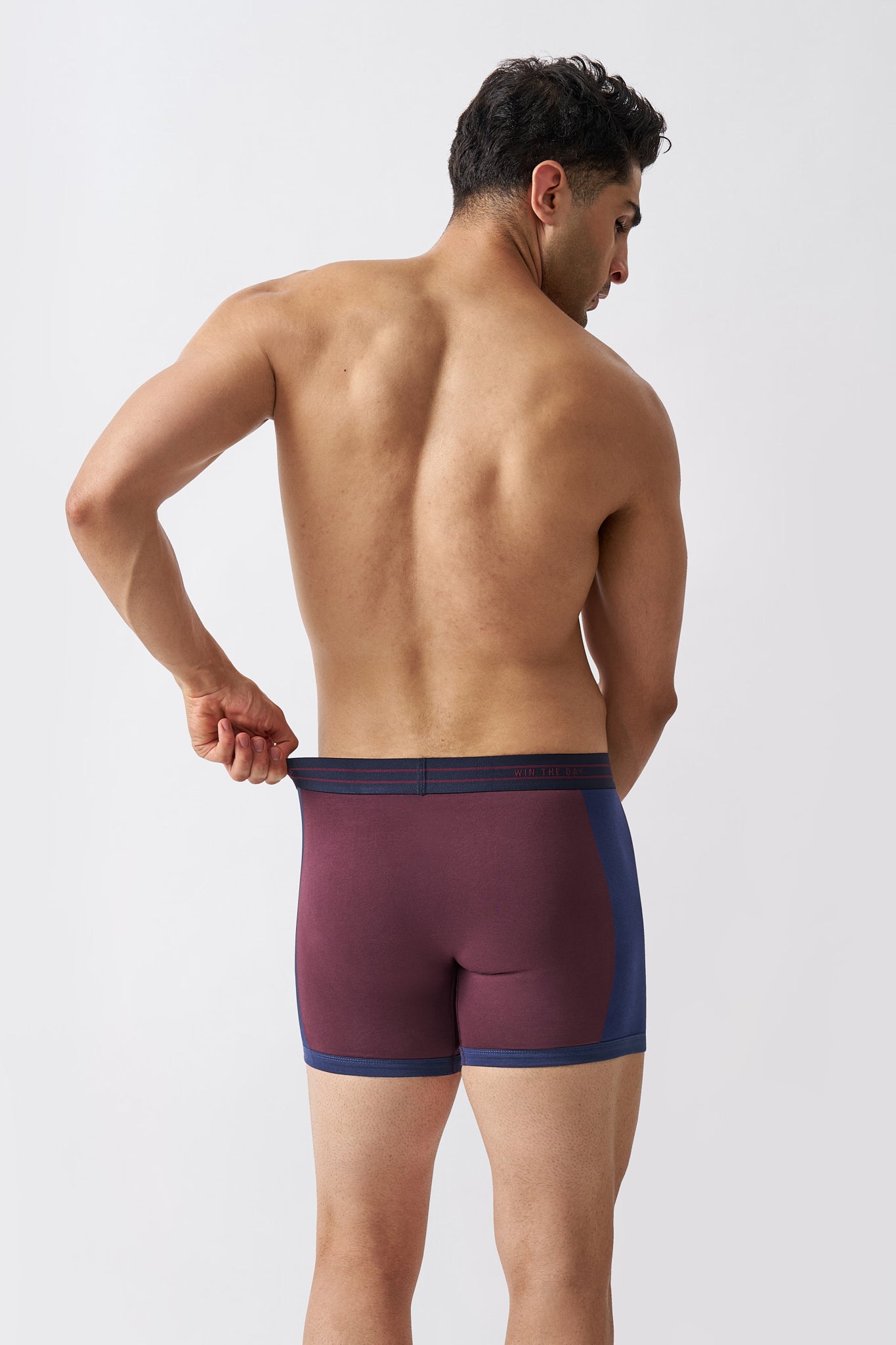 Back view of men's maroon boxer briefs with a flexible stretch waistband and smooth cotton fabric