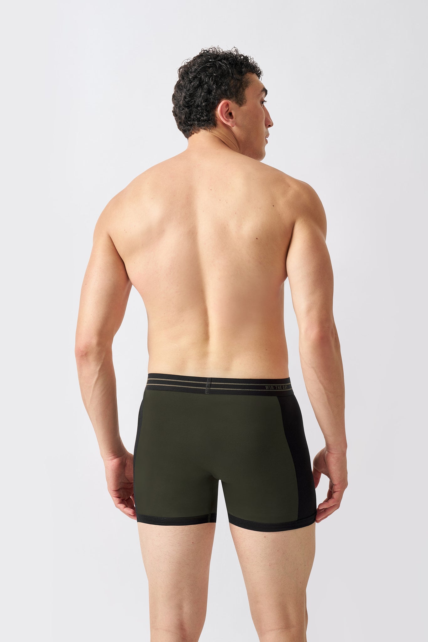 Back view of Macho Genie men's olive cotton boxer briefs with a flexible stretch waistband