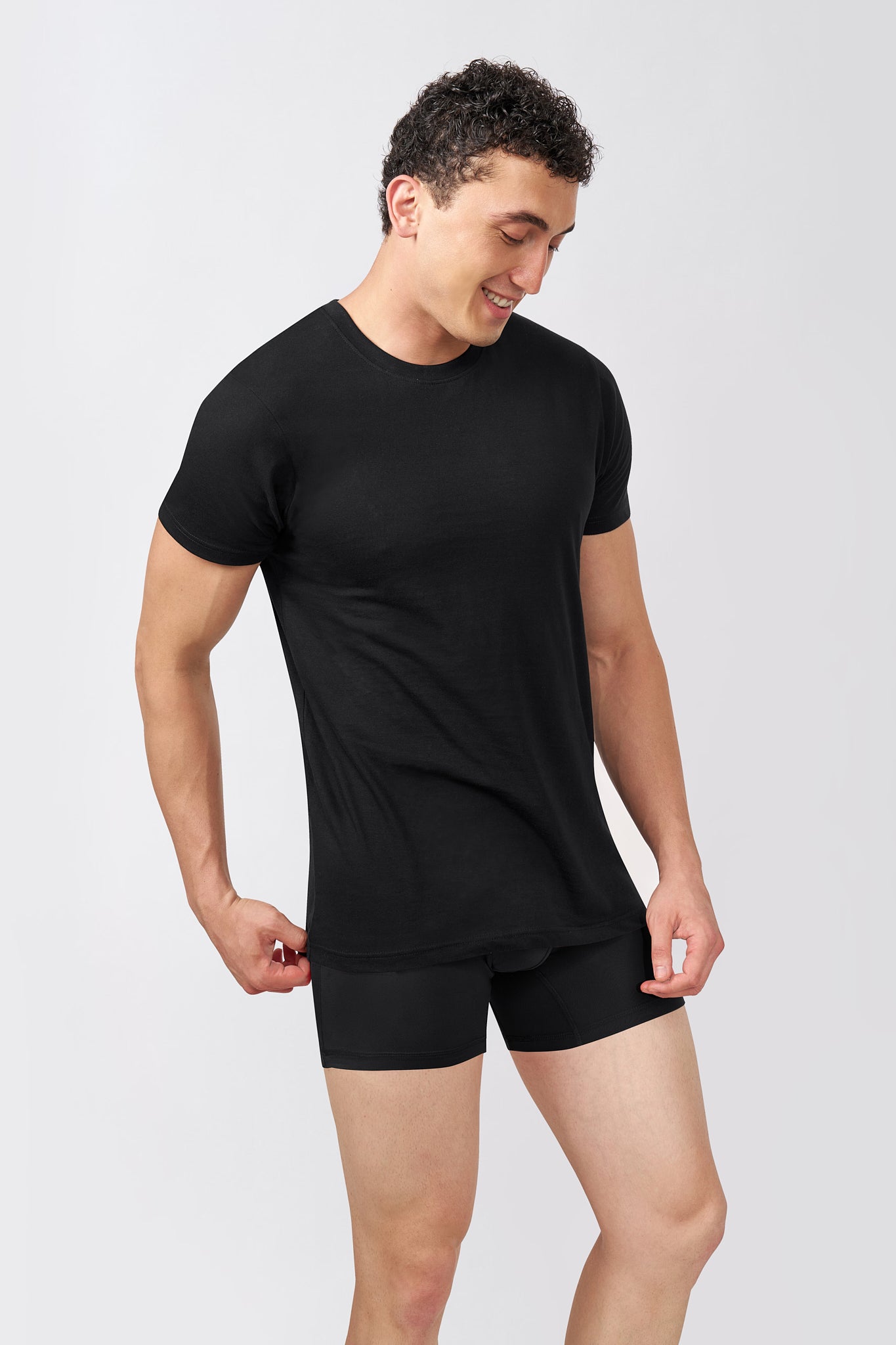 Macho Genie AeroCot Base+ black round neck undershirt showing its comfortable fit, smooth and easy movement for everyday use