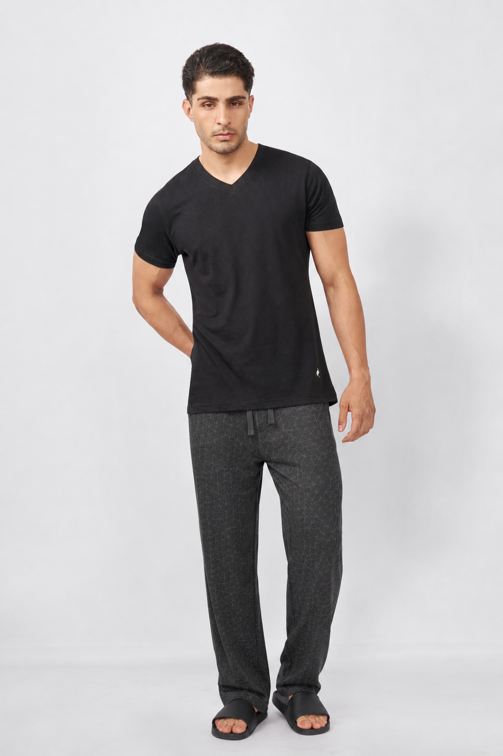 Macho Genie AeroCot Base+ men's black V-Neck undershirt in 100% cotton, styled with relaxed lounge pants for casual everyday wear