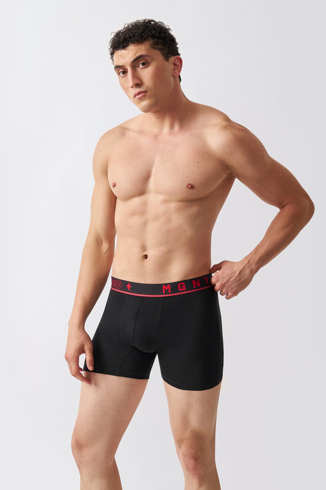 Macho Genie men's black Bamboo Aeroflex boxer briefs featuring a contoured front pouch and supportive extended-leg construction