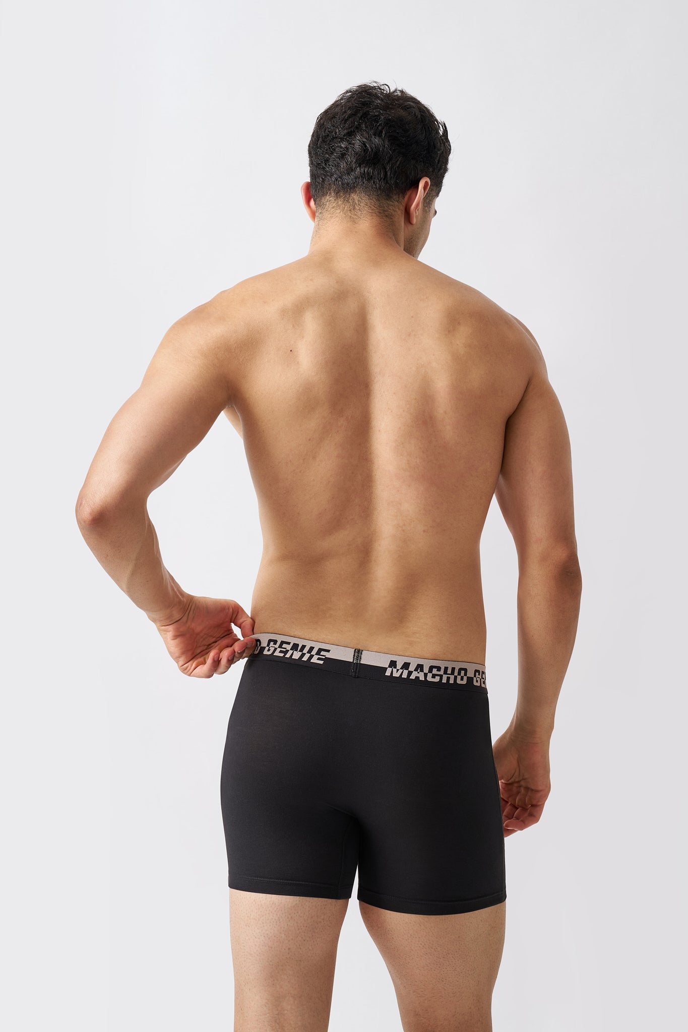 Back view of Macho Genie Black Supima Blend boxer briefs showing extended leg coverage and shape-retaining construction