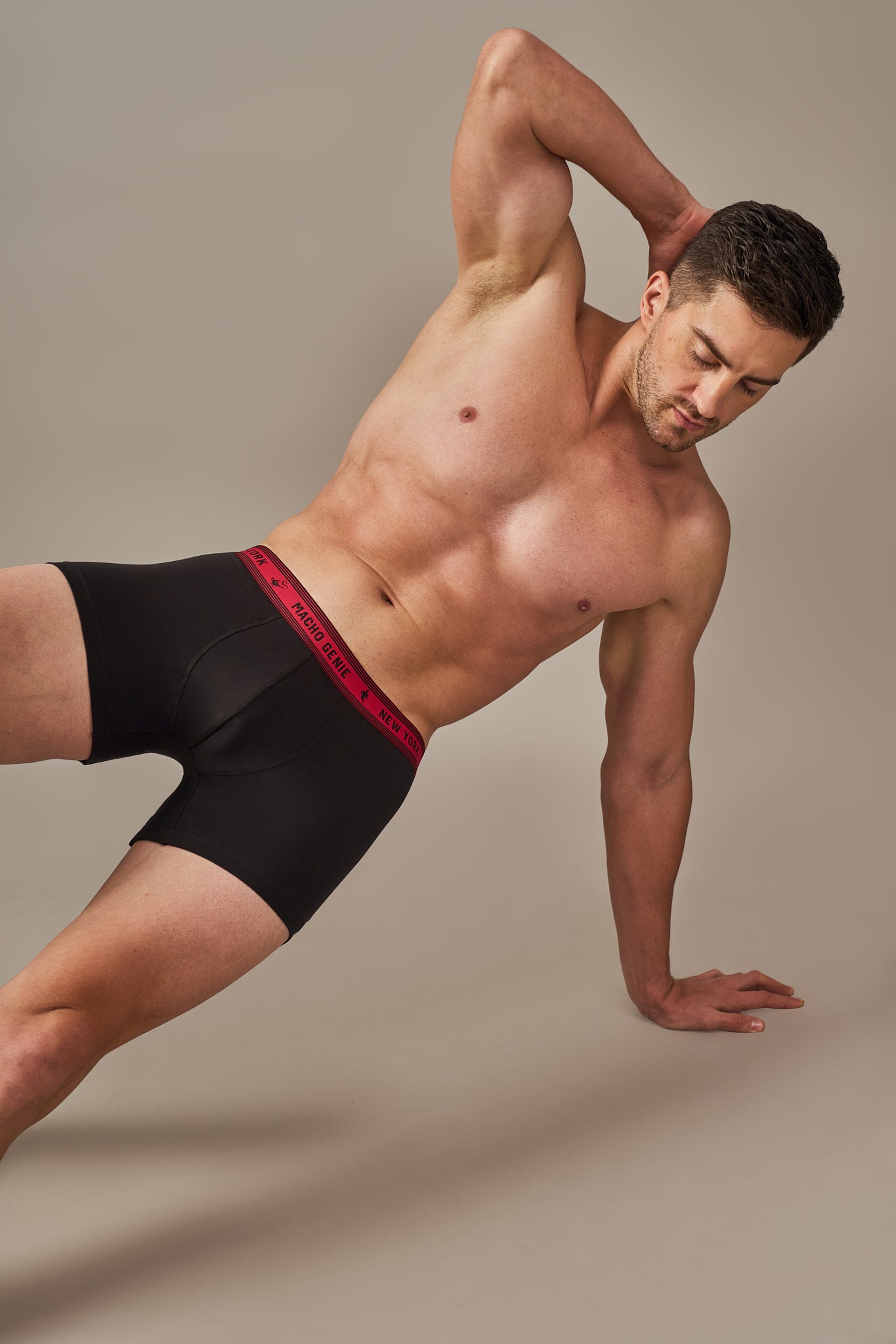 Macho Genie Bold Impressions men's cotton trunks in Raven Black shown in side profile, showcasing the tailored silhouette and 3-inch inseam