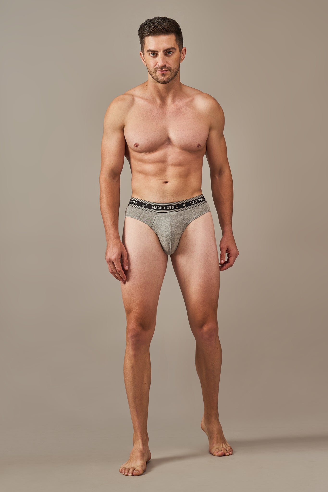 Macho Genie Bold Impressions men's underwear shown in a full-body front view with a comfortable contoured pouch and full coverage fit in gray color