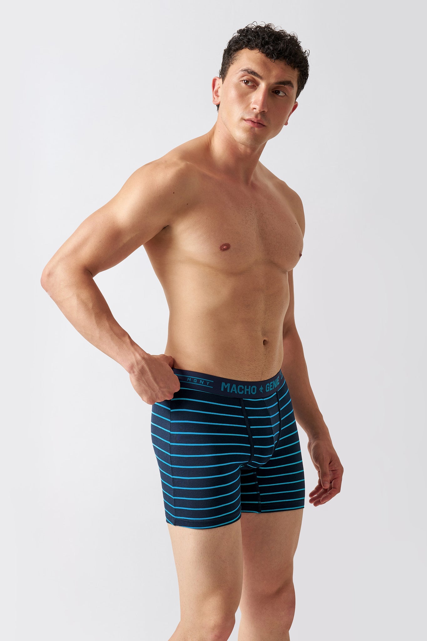 Macho Genie Luxe Stripe men's blue striped boxer brief underwear shown from an angled view with soft breathable cotton fabric