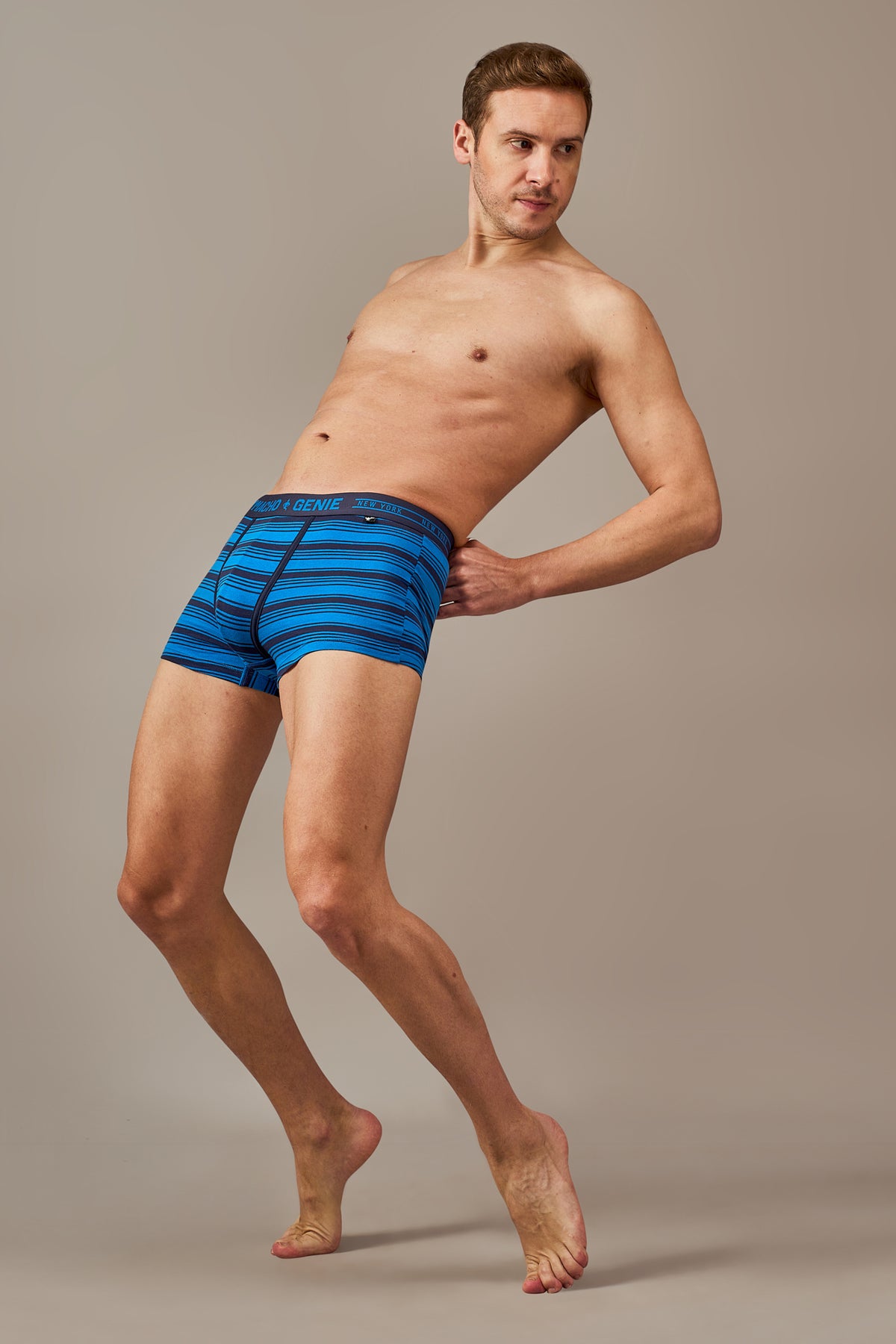 Men's blue and black striped cotton trunks with a supportive pouch