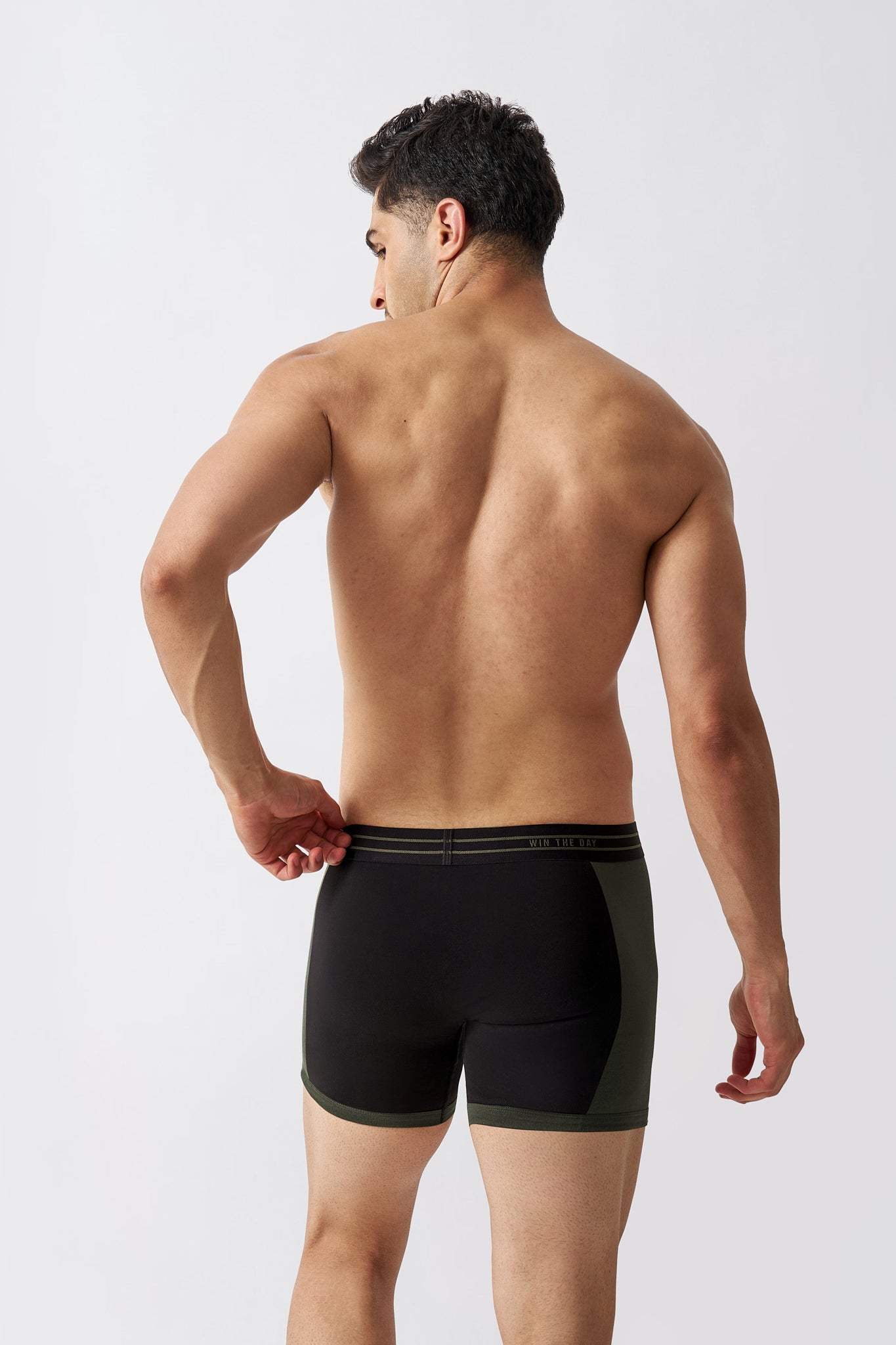Back view of Macho Genie men's black cotton boxer briefs with a stretch waistband