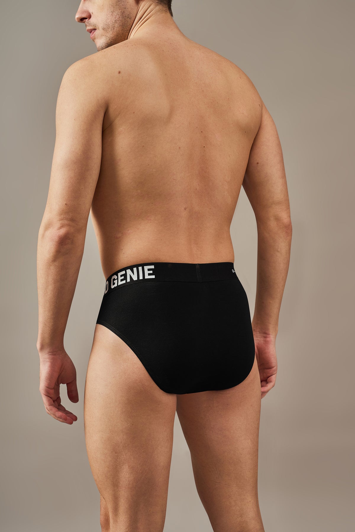 Macho Genie Midnight Black modal briefs shown from the back, highlighting smooth full coverage, tag-free construction and soft breathable fabric designed to stay comfortably in place