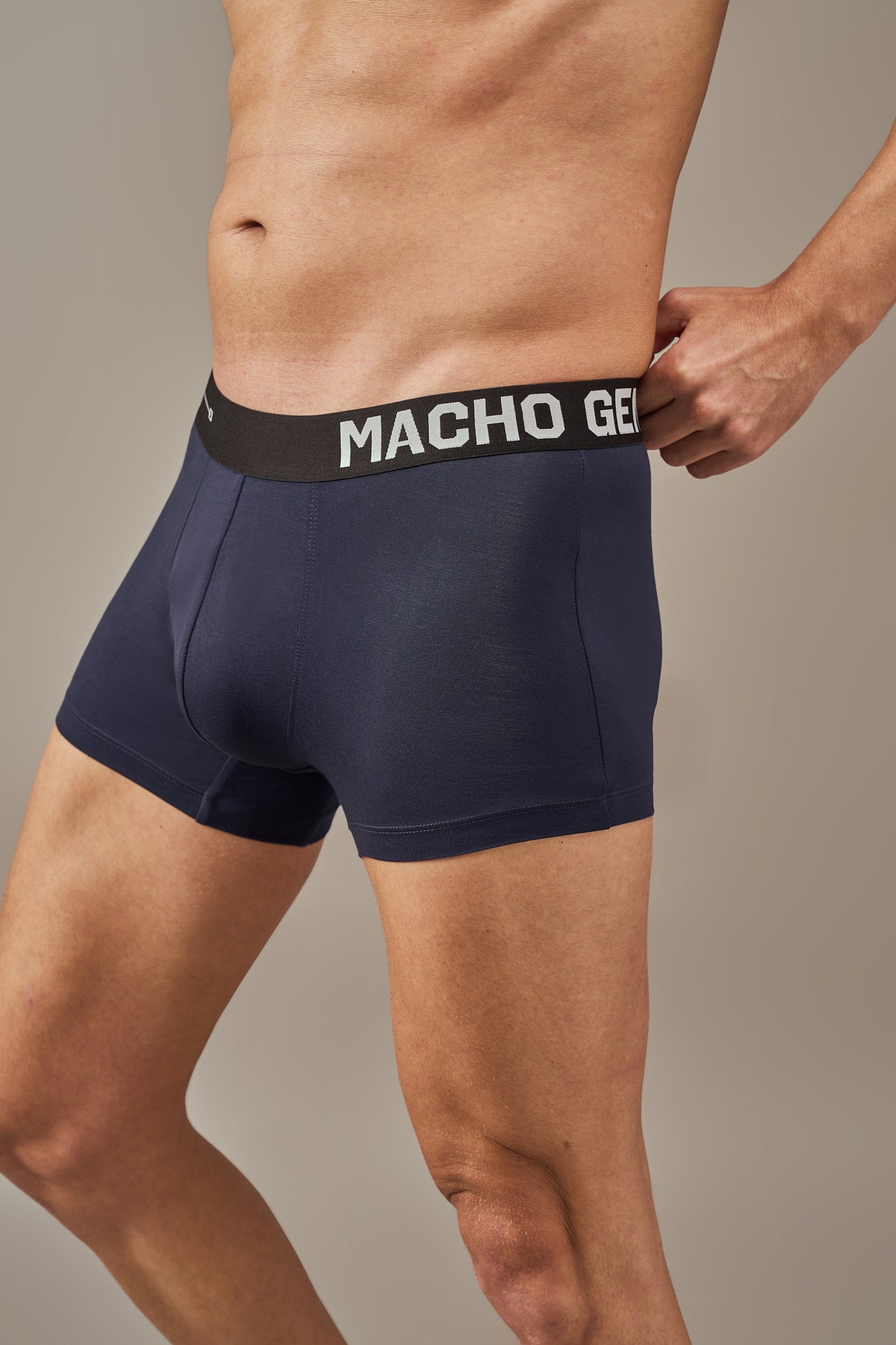 Macho Genie premium blue modal trunks shown in a close-up, highlighting the flexible waistband, ultra soft modal fabric and tailored 3 inch seam for comfortable everyday wear.
