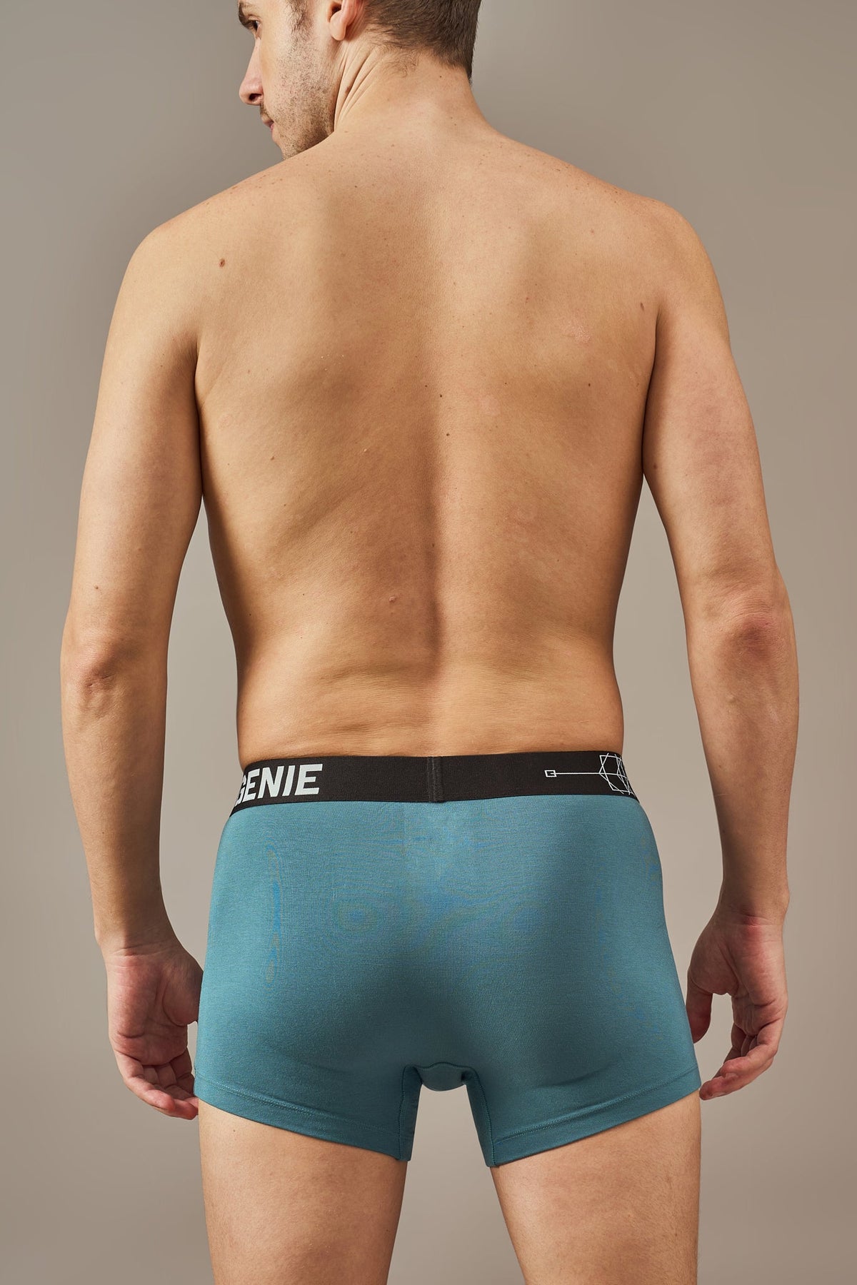 Macho Genie teal blue modal trunks shown from the back, featuring ultra soft bio washed fabric, comfortable coverage, a 3 inch seam and flexible waistband for a stay-in-place fit