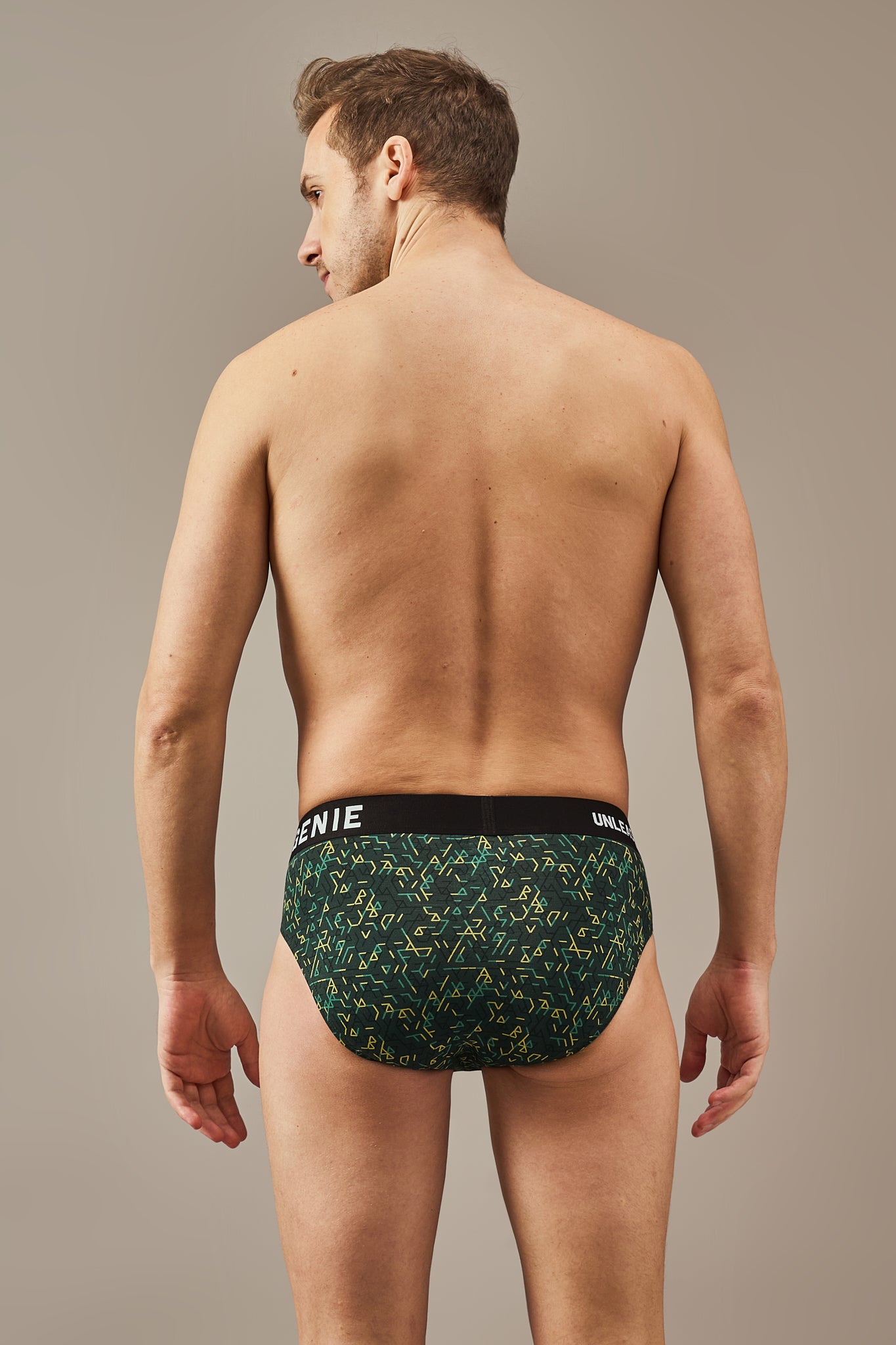 Ultra soft men’s green modal Y-shaped inner wear briefs with vibrant yellow and green printed detailing, bio washed modal fabric, flexible waistband and full coverage construction for smooth lasting comfort