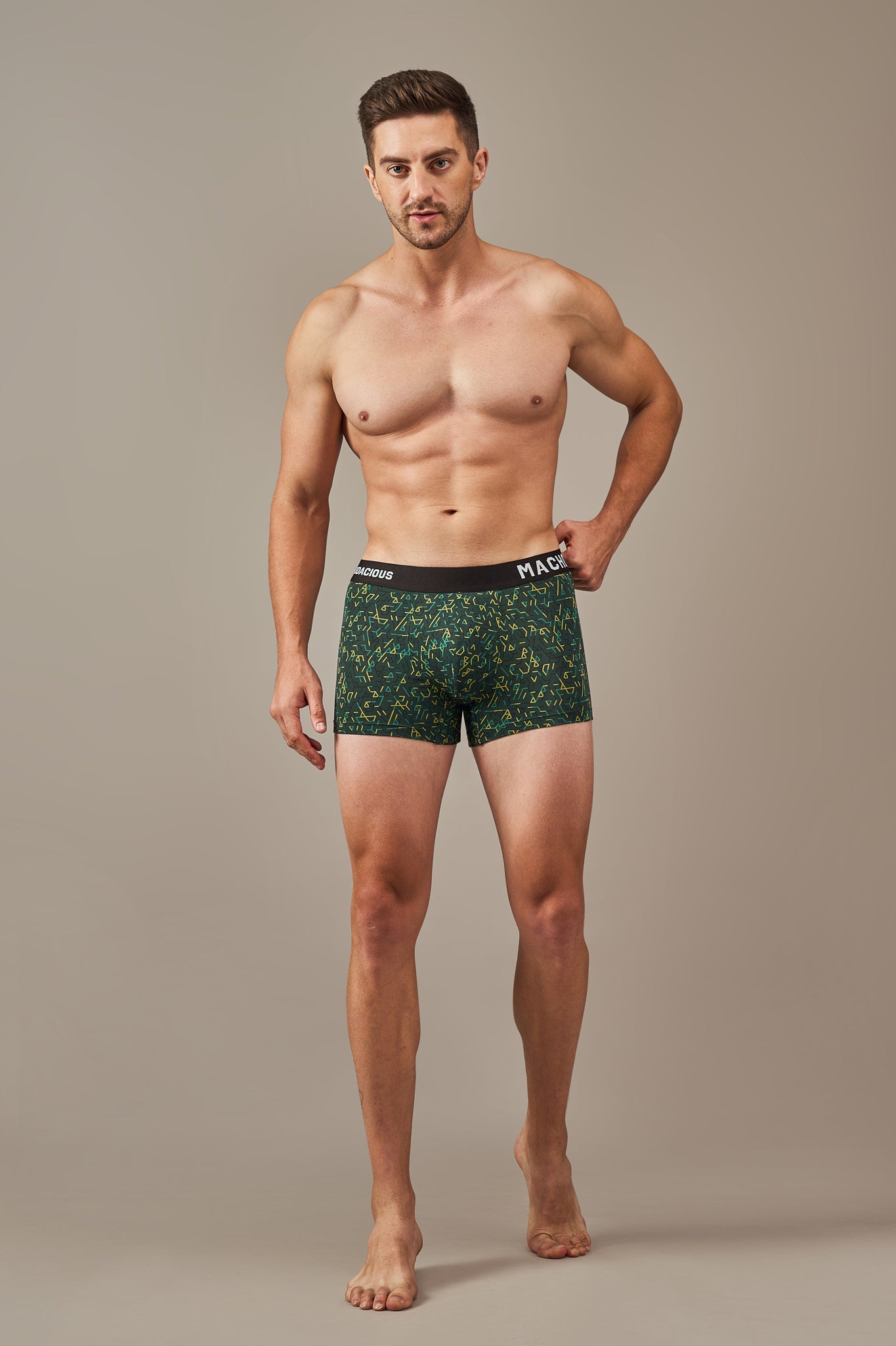 Macho Genie men’s vibrant Pine Green modal trunks featuring ultra soft fabric, flexible waistband, printed pattern and three inch inseam