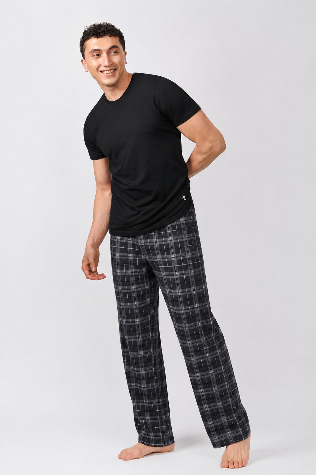 Macho Genie AeroCot Base+ men's black round neck undershirt styled with checked lounge pants for relaxed homewear and everyday comfort